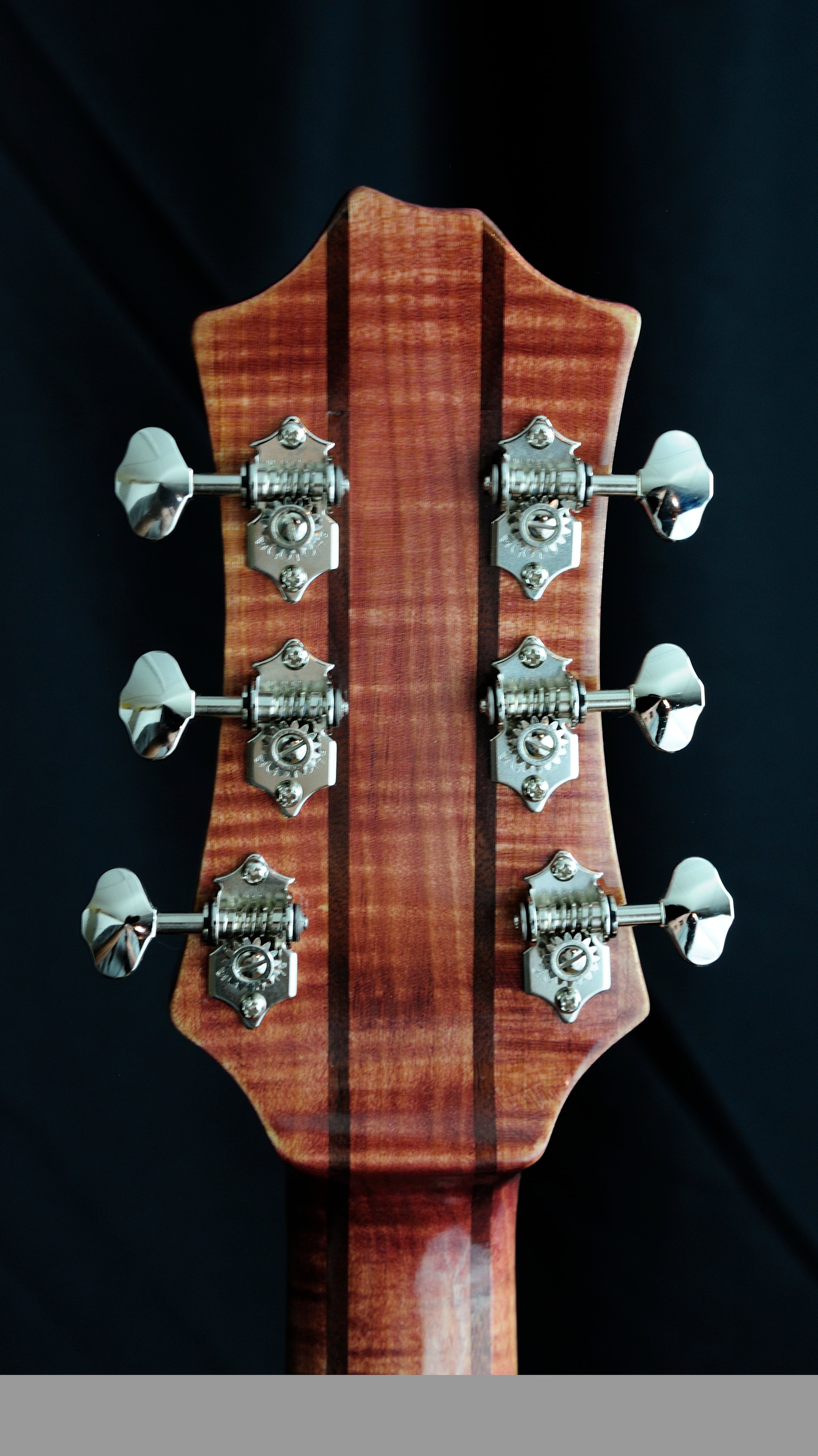 MRK02A — headstock back showing flamed maple and Gotoh tuners