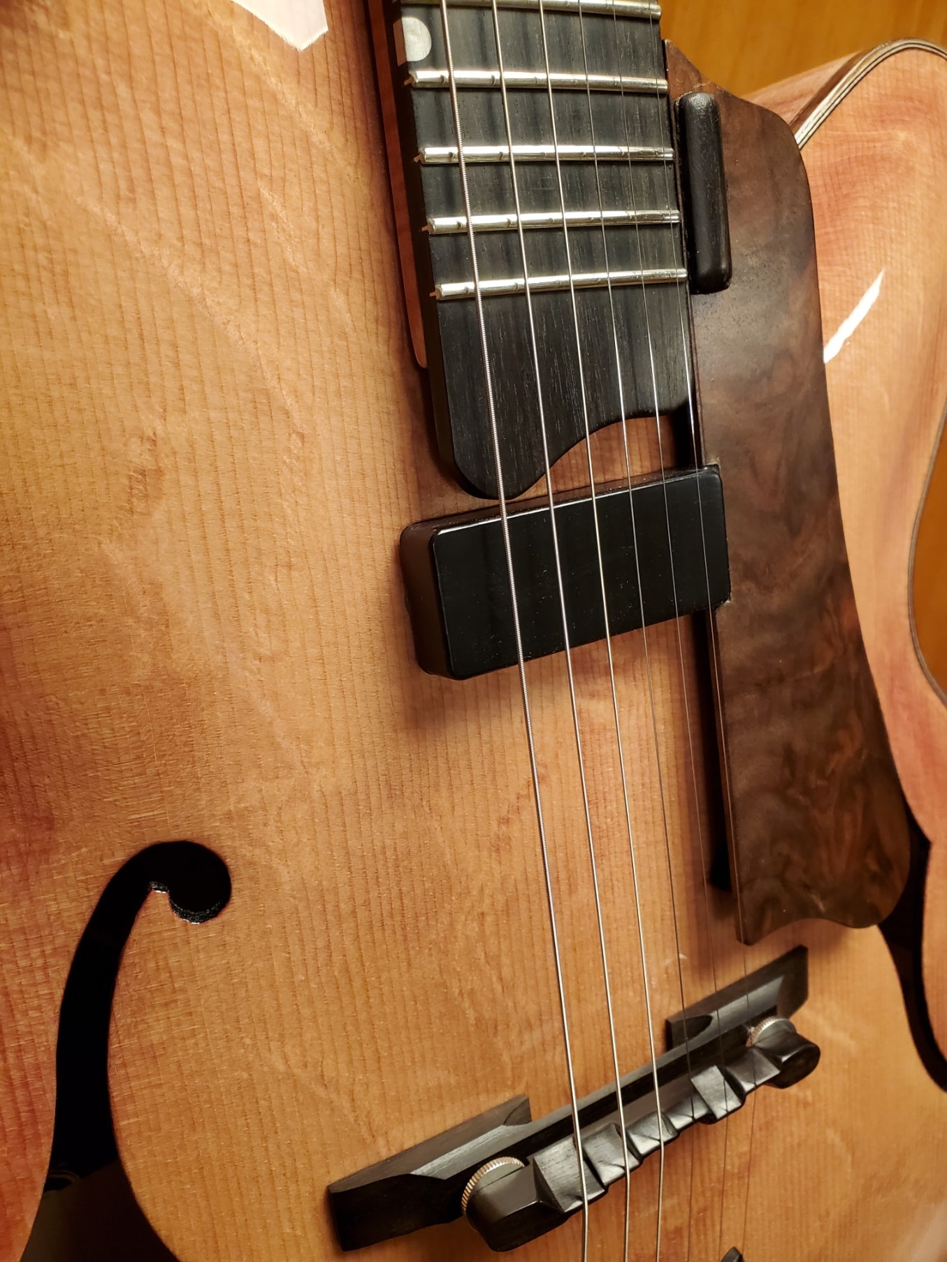 MRK02A — neck and pickup close-up showing ebony fingerboard