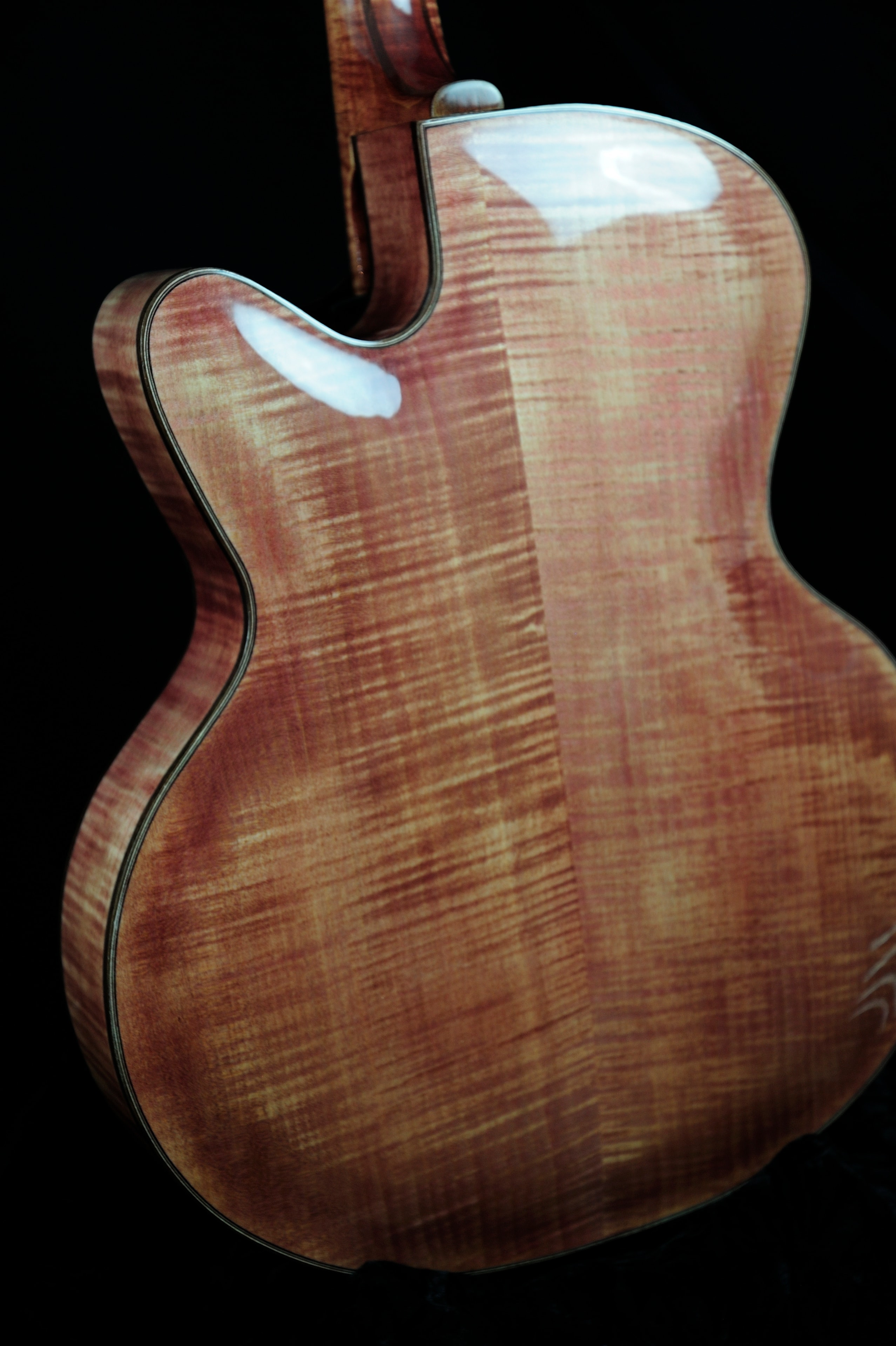 MRK02A — back view showing highly flamed maple body