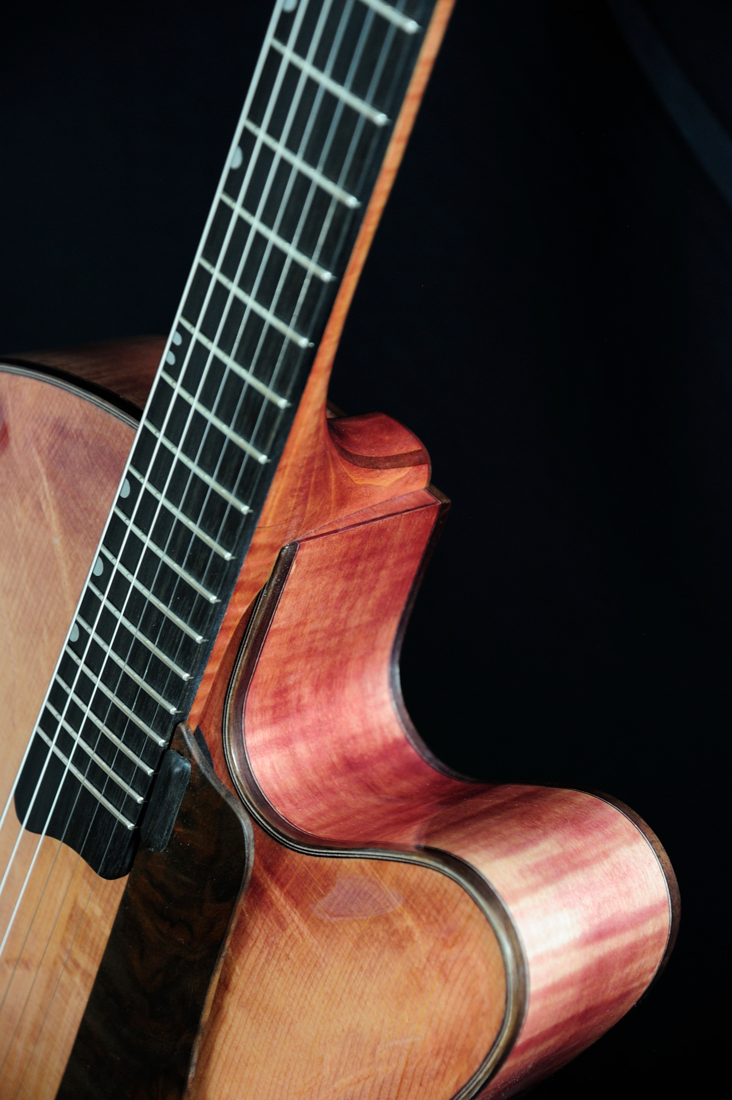 MRK02A — cutaway and neck joint detail showing flamed maple sides