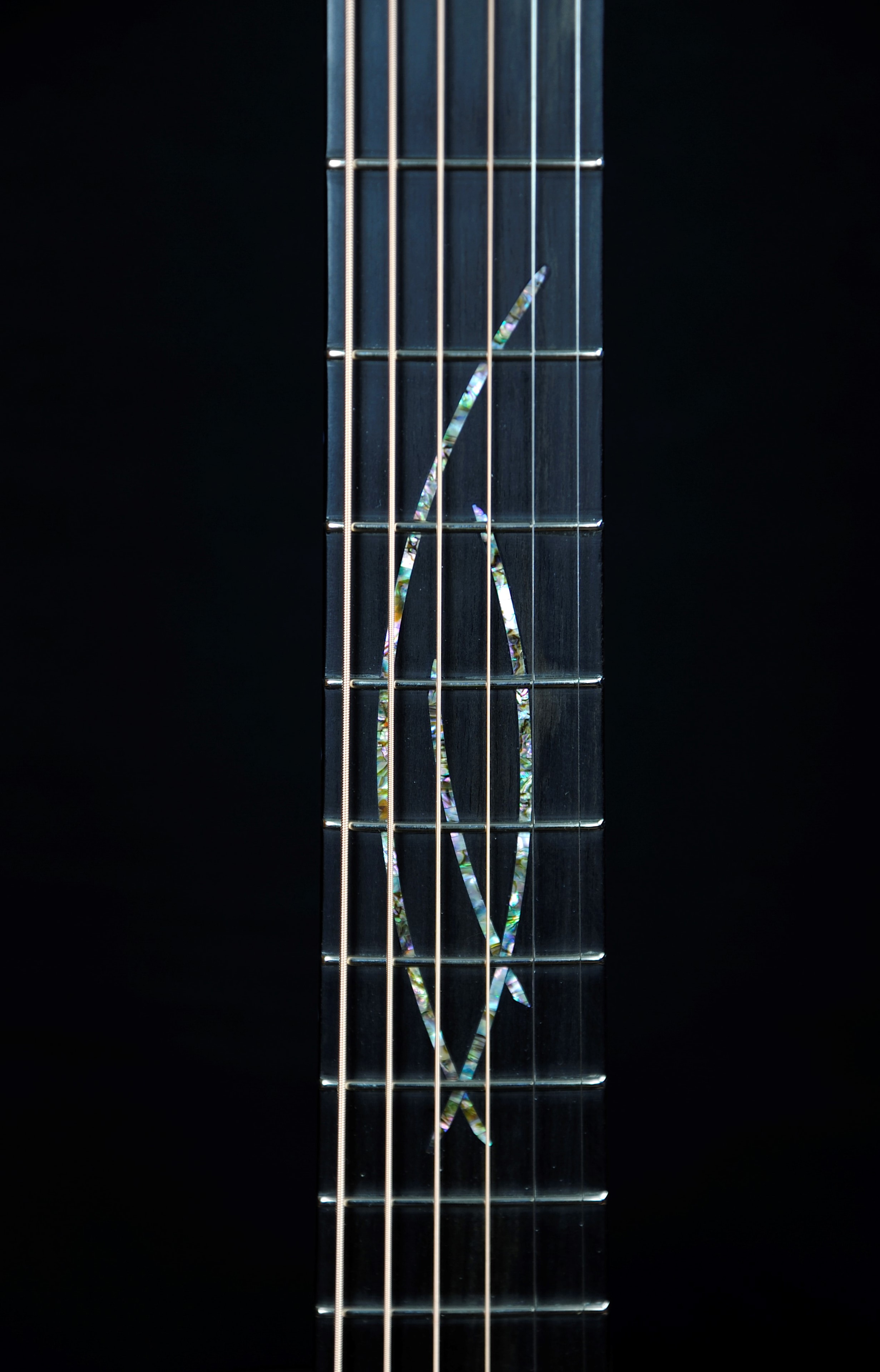 MRK01B-0617L — headstock front showing custom abalone fingerboard inlay