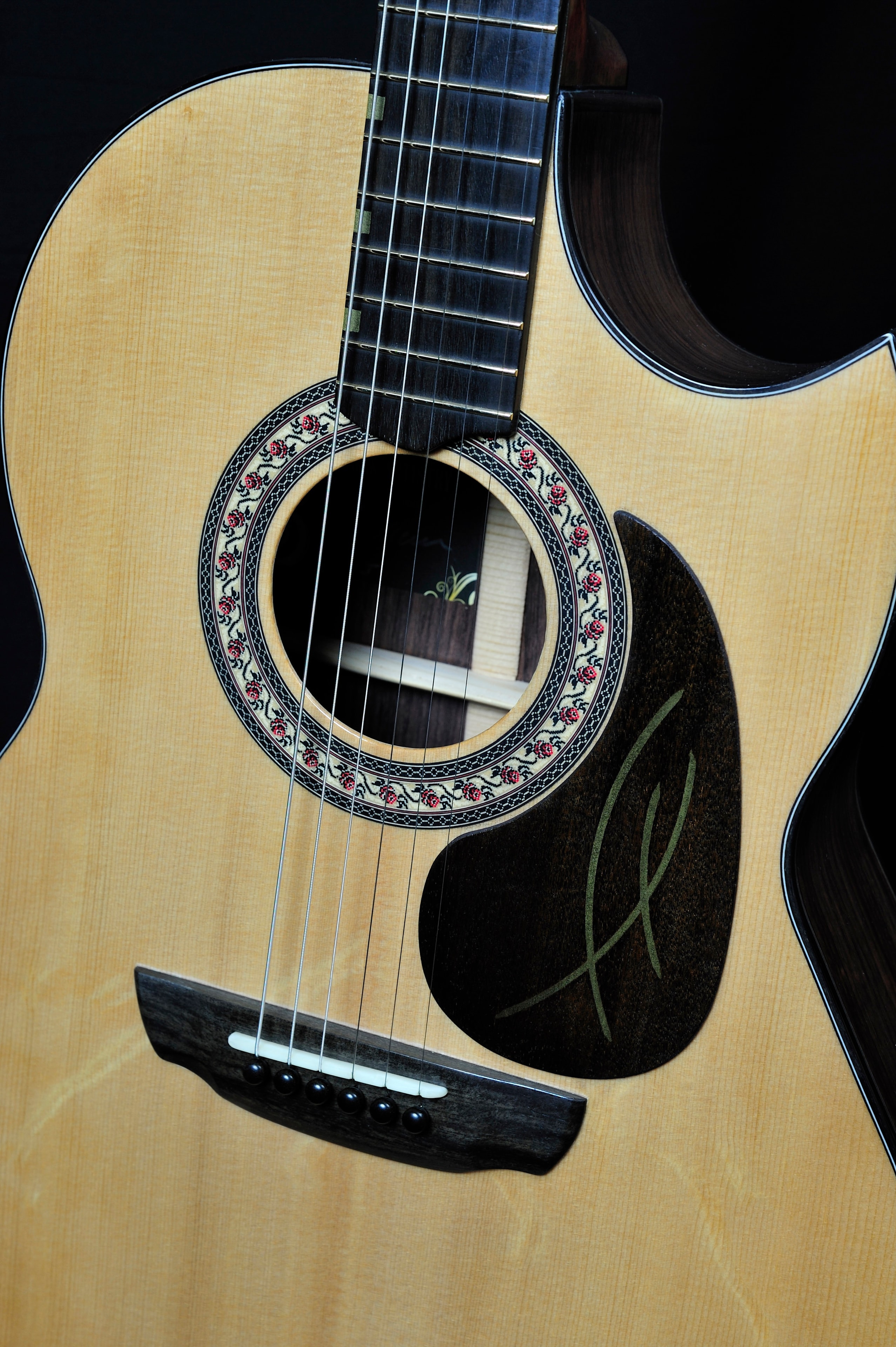 MRK01B — lower bout side view showing Brazilian rosewood and ebony binding