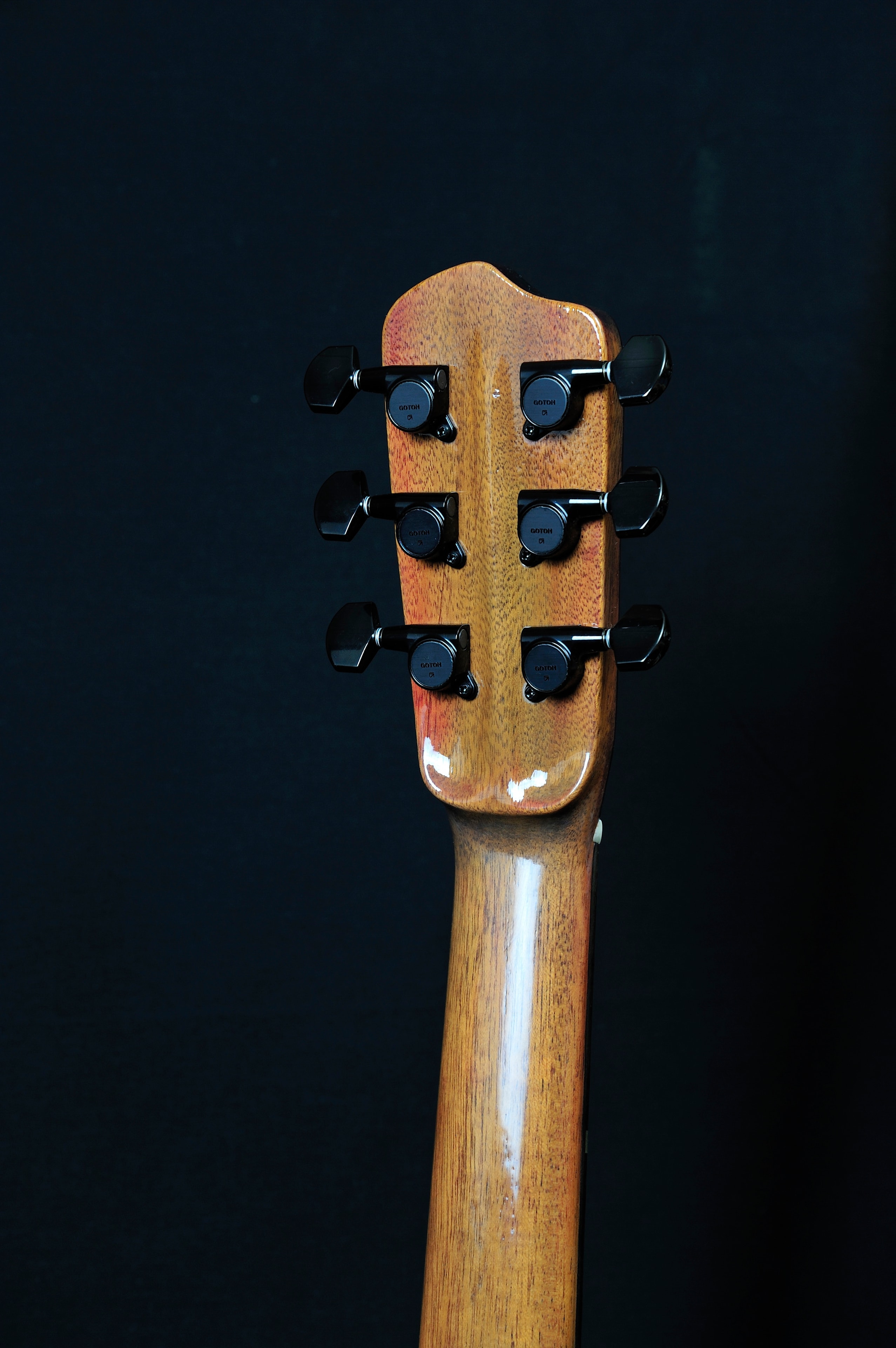 MRK01B — headstock back showing Goth black tuners and mahogany neck