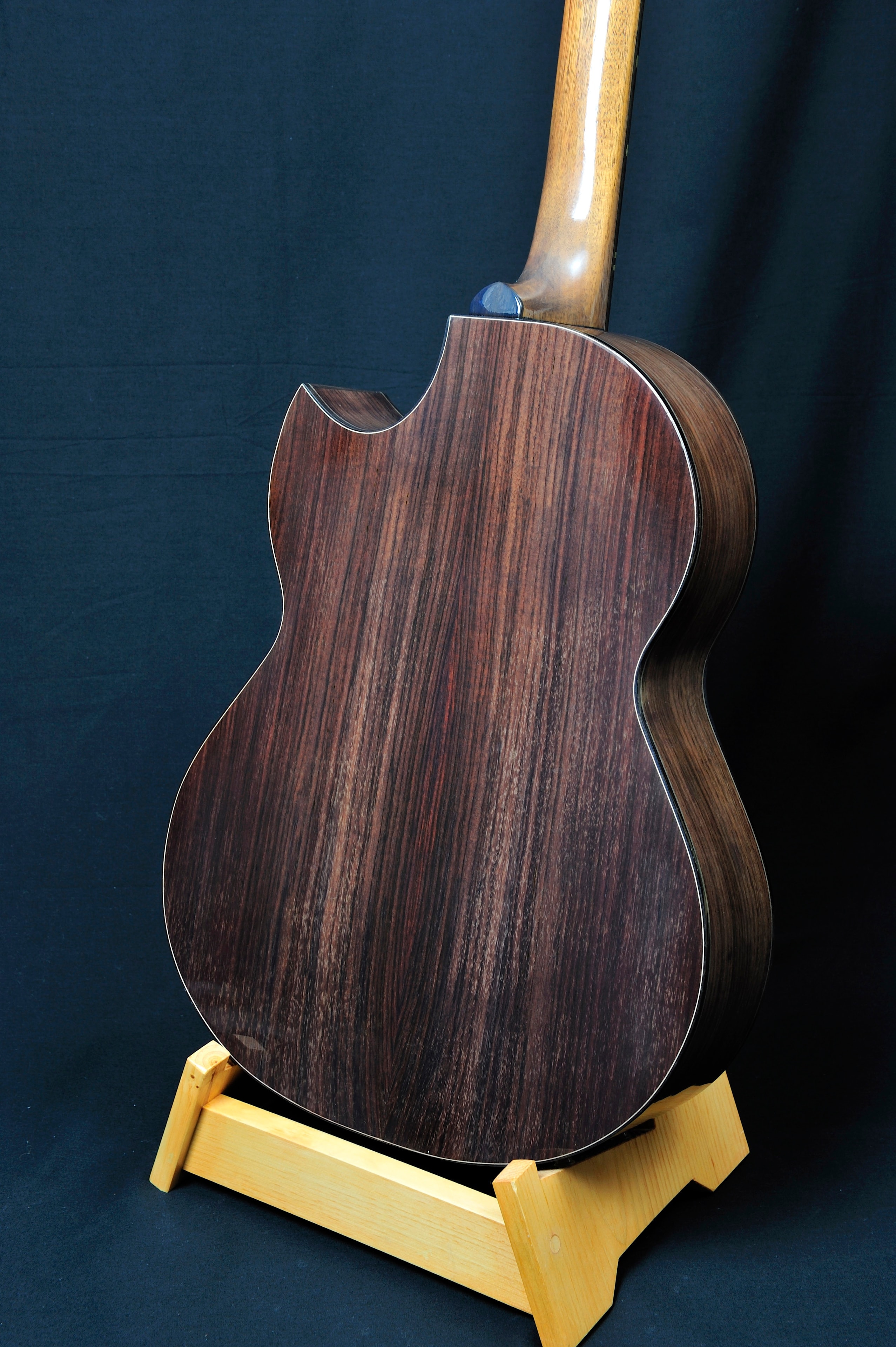 MRK01B — headstock front showing MRK Artistry logo and abalone inlay